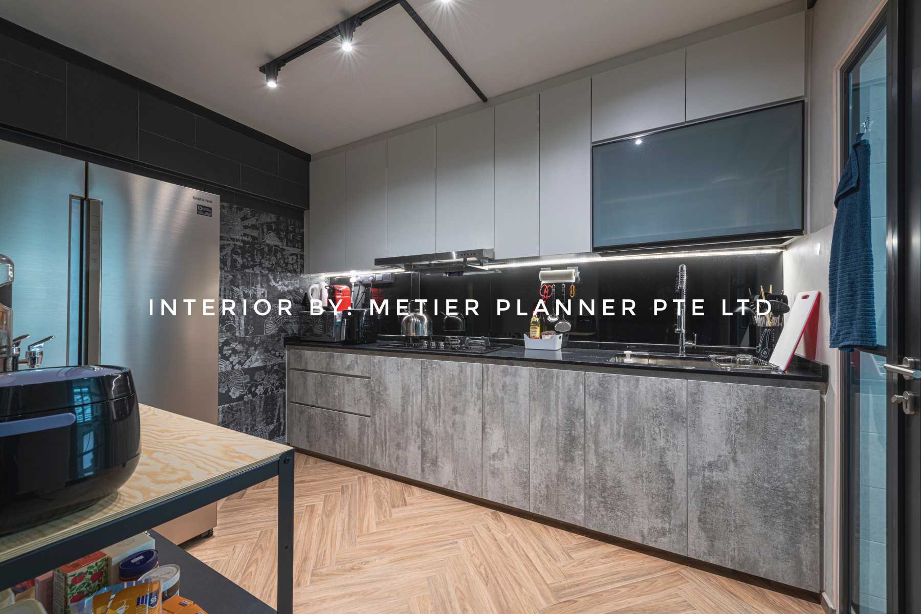 Industrial Kitchen with Countertop and Herringbone Tiling