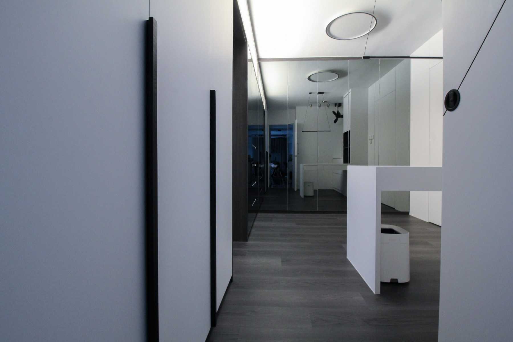 Minimalist Study with Ceiling Light and Wall Shelves