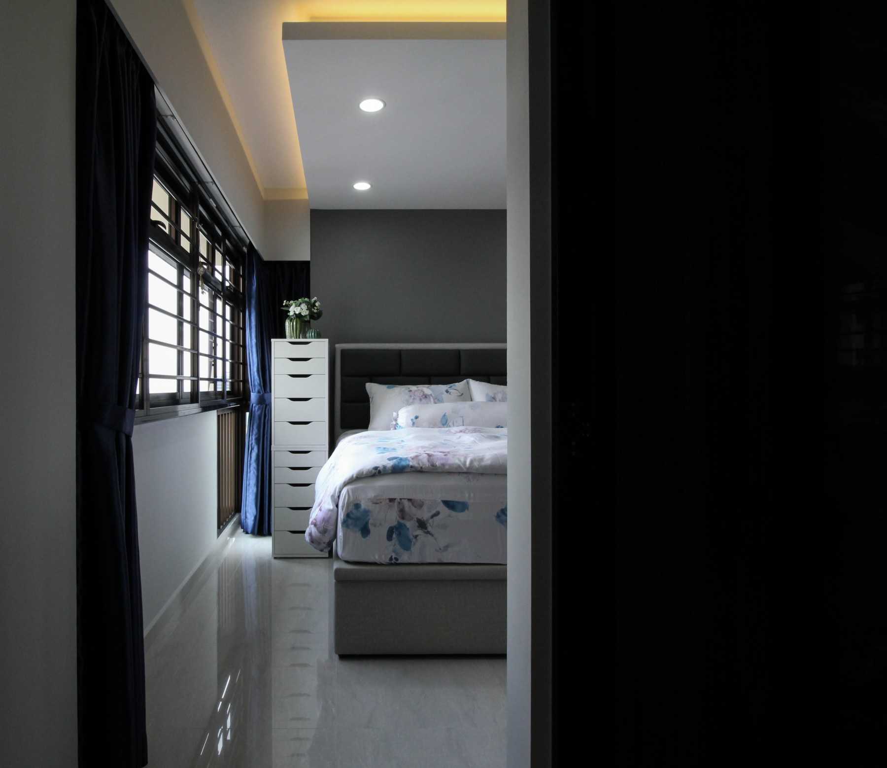 Contemporary Bedroom with Homogeneous Tiles and Cove Lighting