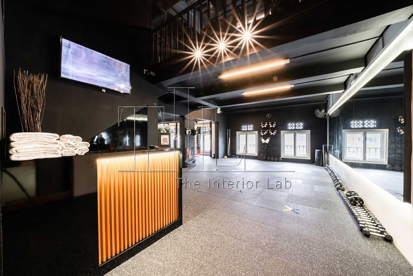 Industrial Studio with Metal Gate and Gym Equipment