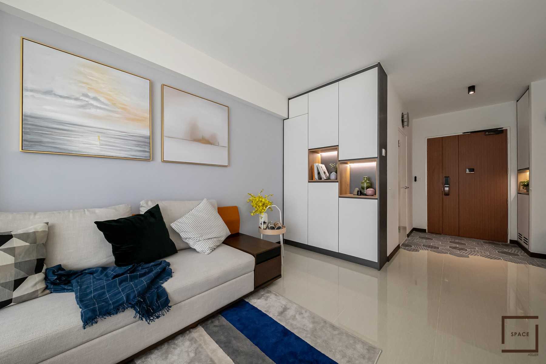 Minimalist Living Room with Bookshelf and Granite Floor