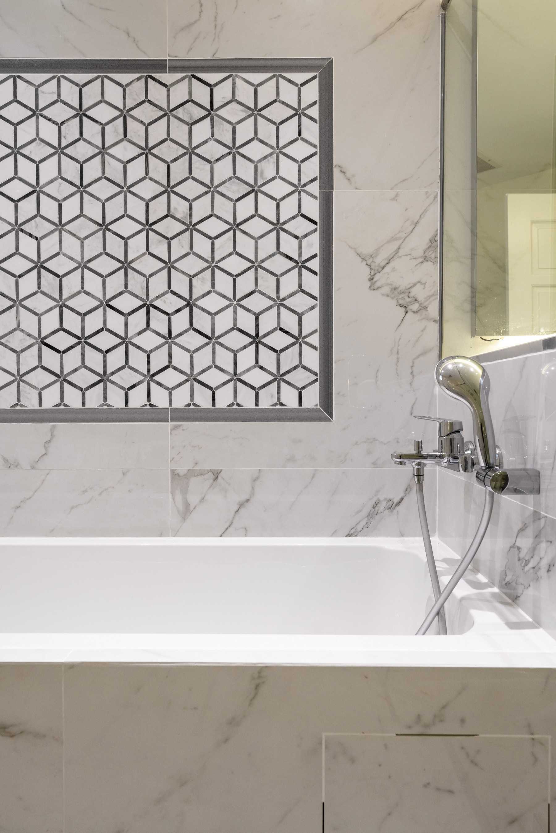 Modern Bathroom with Marble Floor and Feature Wall