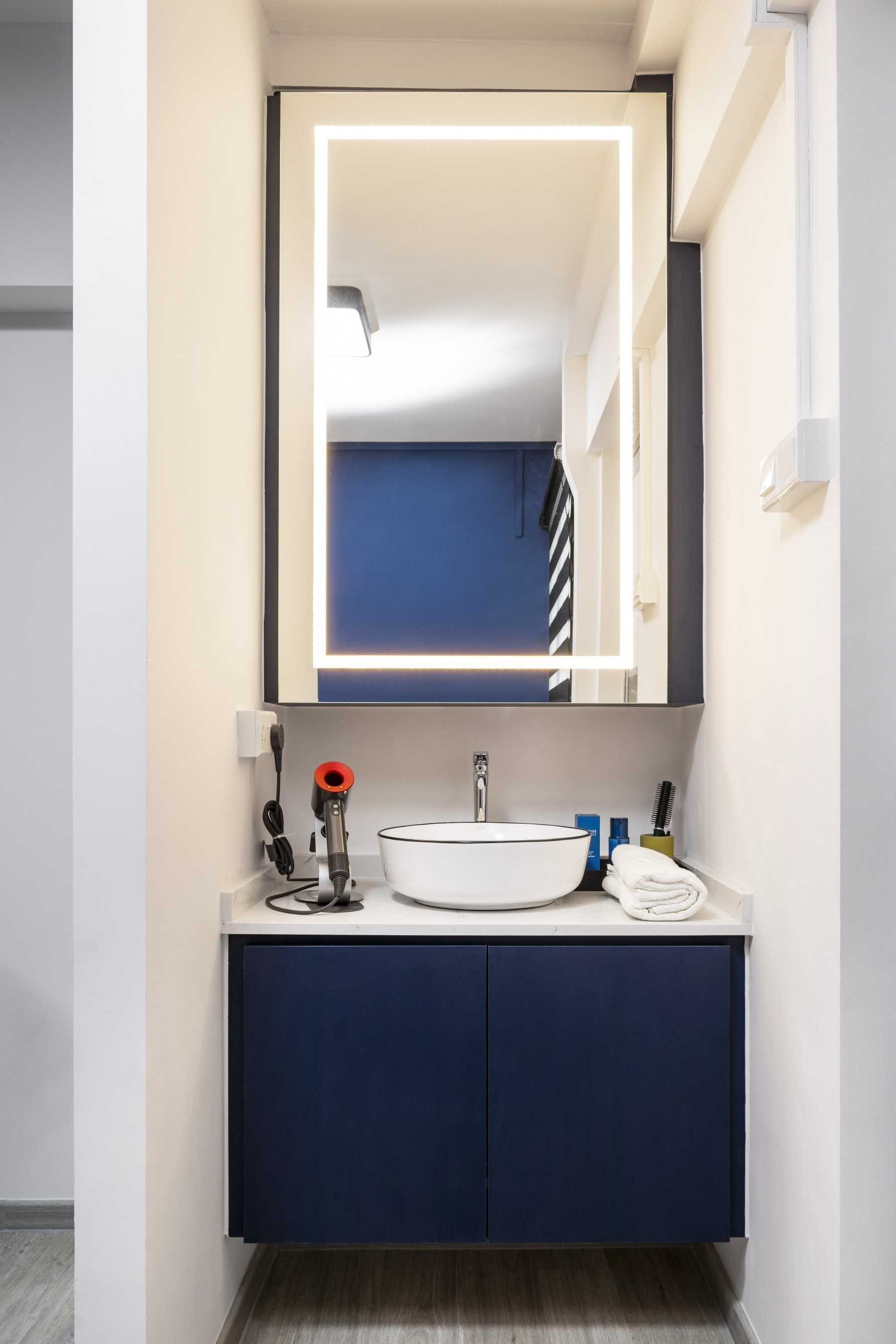Minimalist Bathroom with Countertop and Mirror