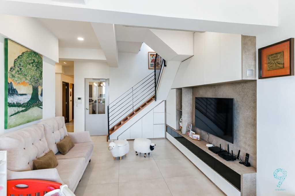 Modern Living Room with TV Console and Staircase