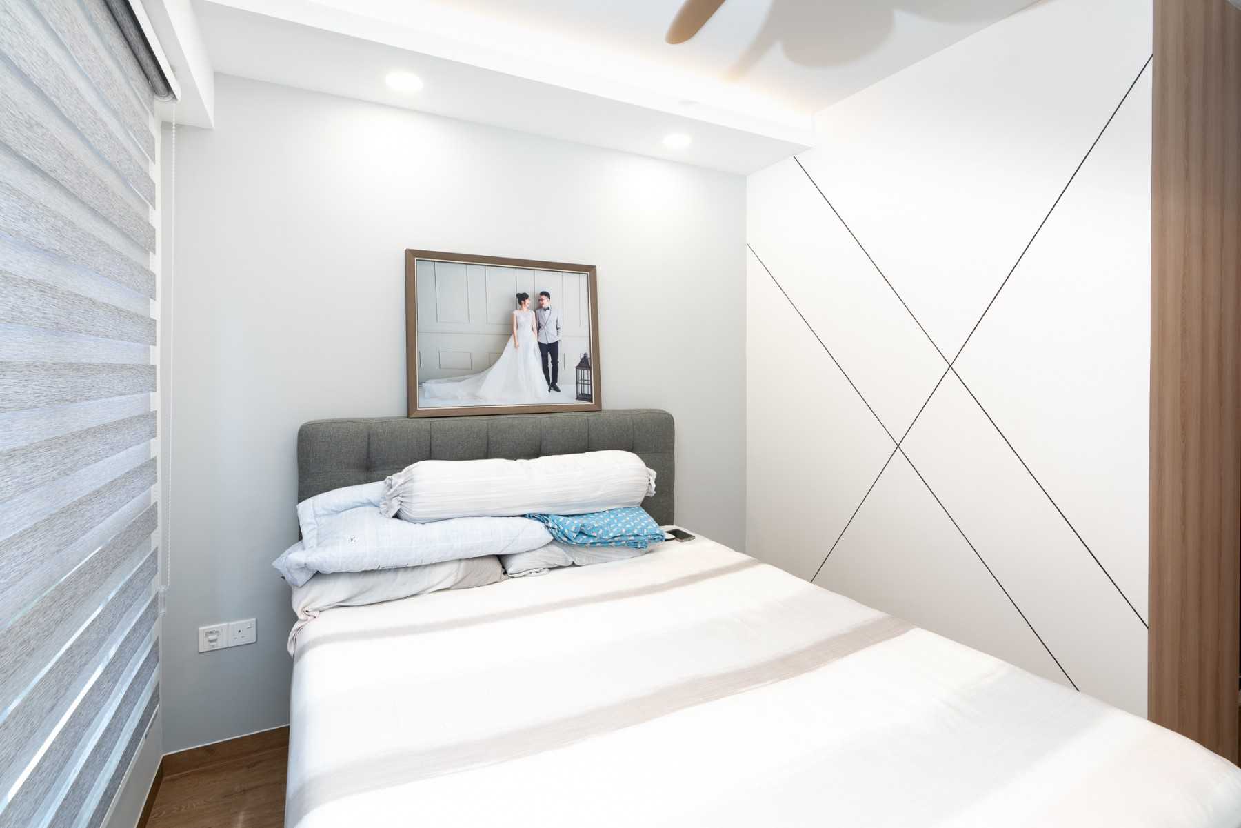 Minimalist Bedroom with Ceiling Fan and Roller Blinds