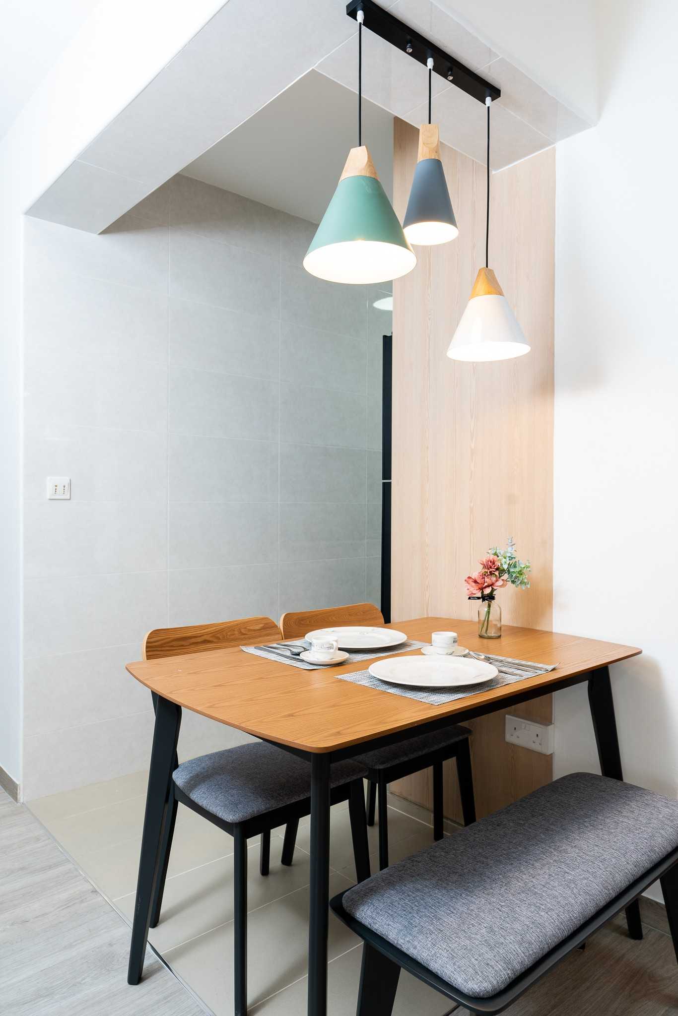 Minimalist Dining Room with Ceiling Light and Dining Table
