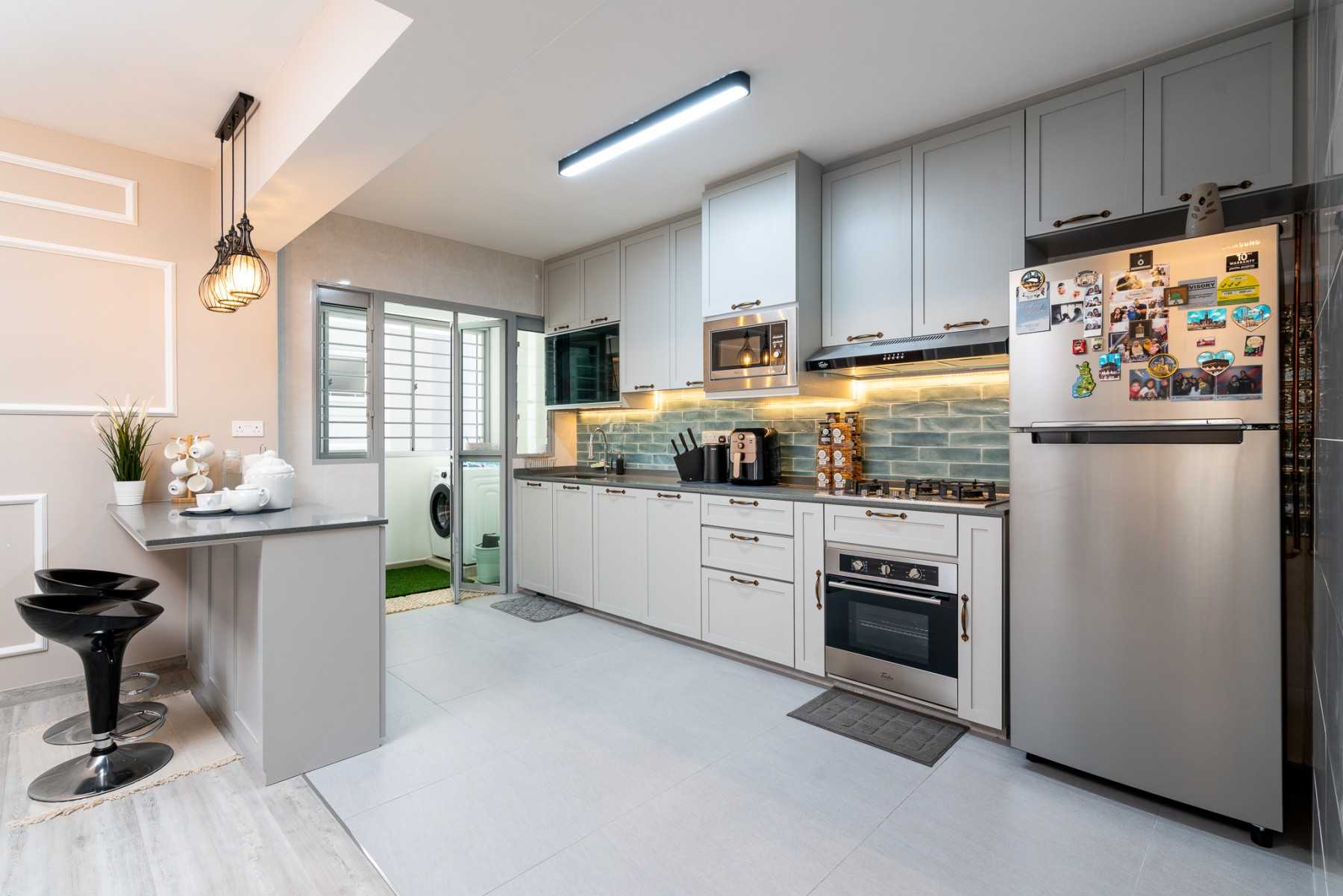 Transitional Kitchen with Countertop and Washing Machine