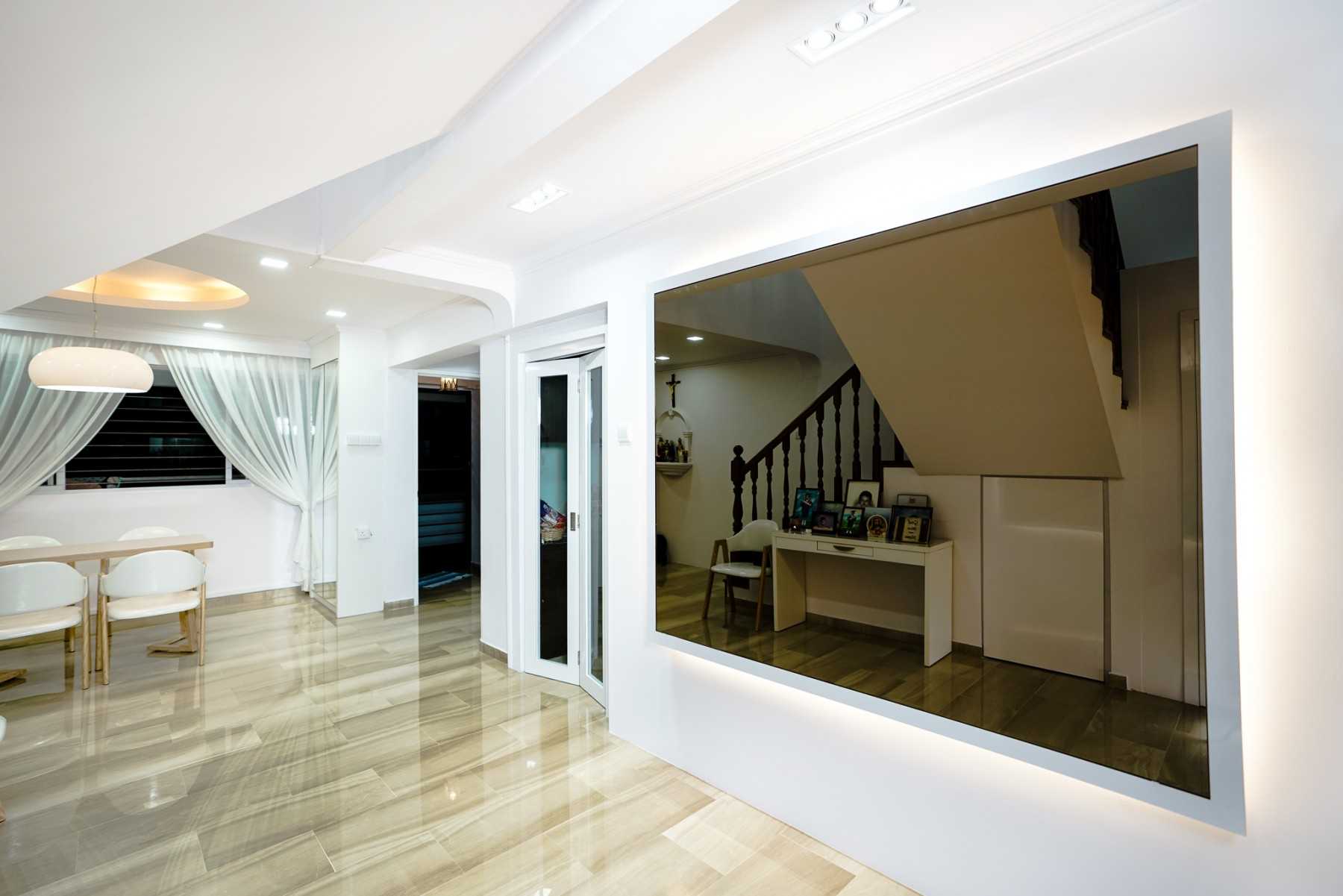 Modern Foyer with Mirror and Ceiling Light