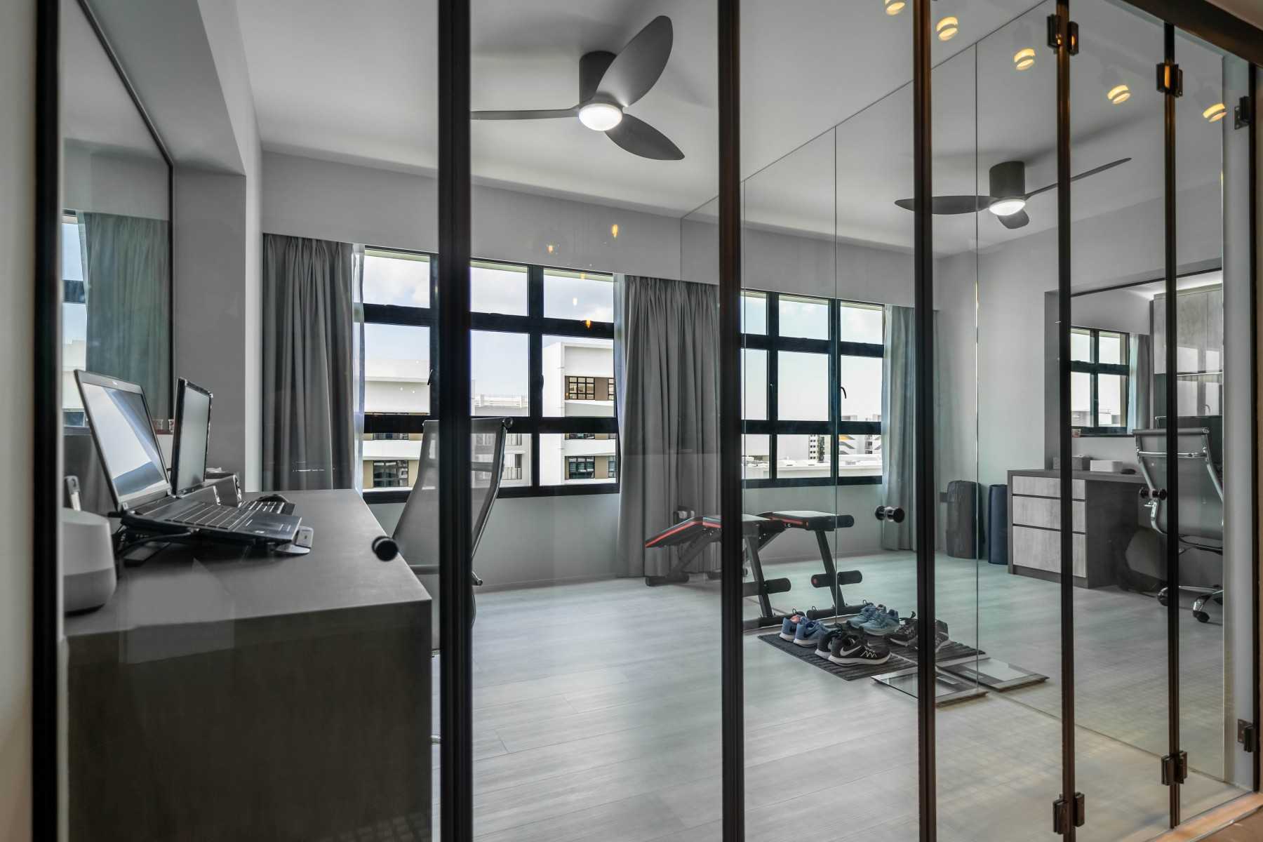 Contemporary Home Office with Mirror and Glass Door