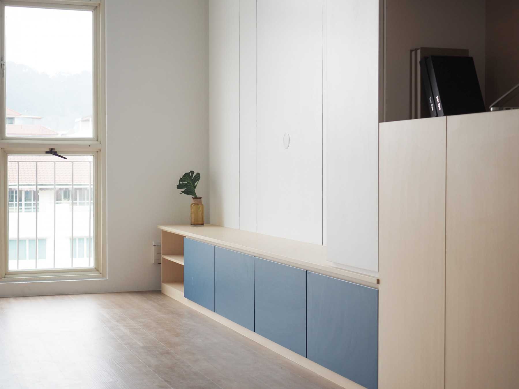 Modern Living Room with Bookshelf and Vinyl Flooring