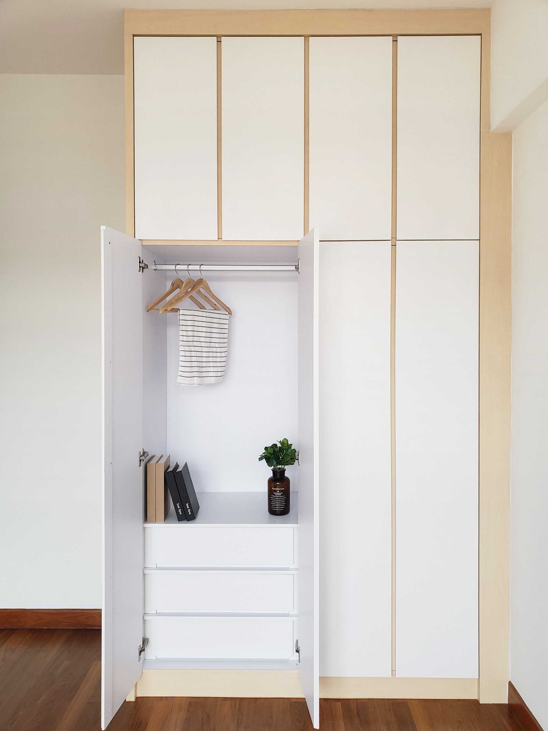 Modern Bedroom with Wood Flooring and Wardrobe