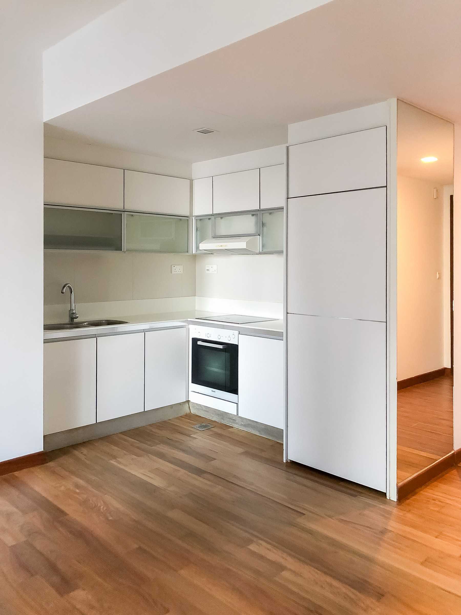 Minimalist Kitchen with Parquet Floor and Paintings