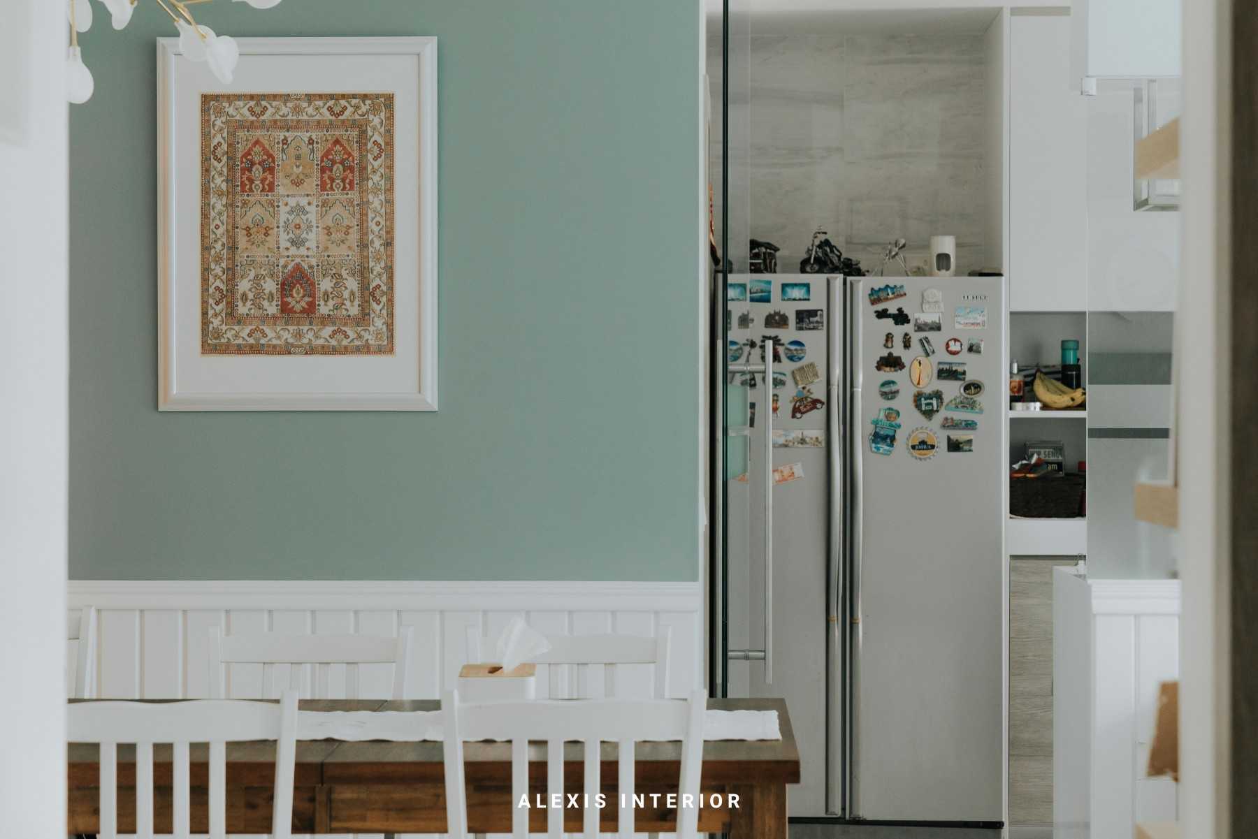 Country Dining Room with Green Wall and Dining Table