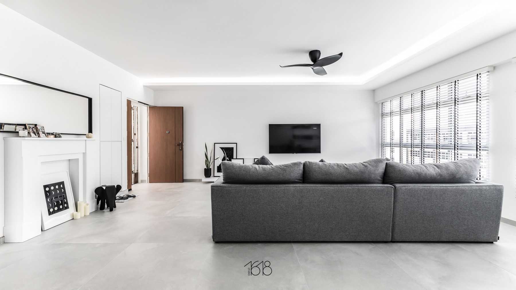 Minimalist Living Room with Homogeneous Tiles and TV Console