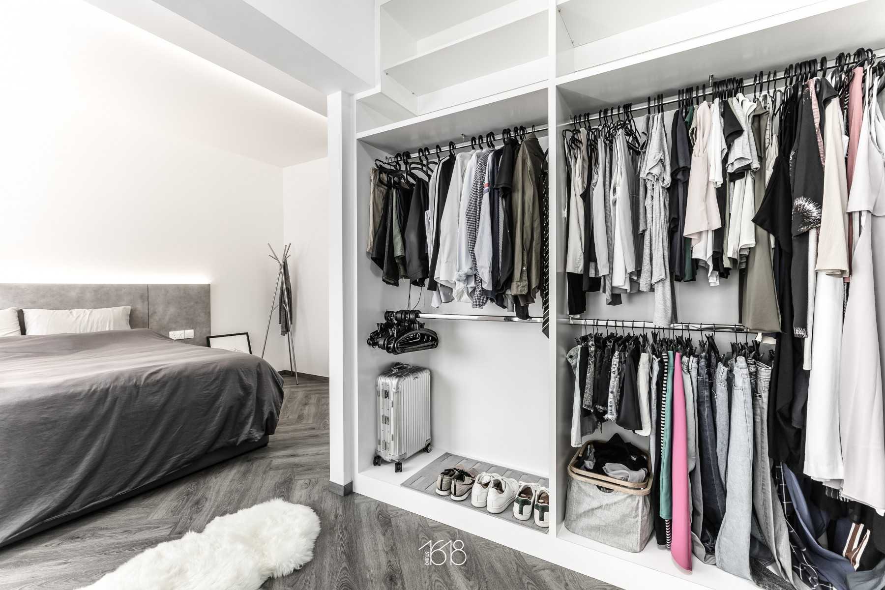 Minimalist Walk-in Wardrobe with Vinyl Flooring and Herringbone Tiling