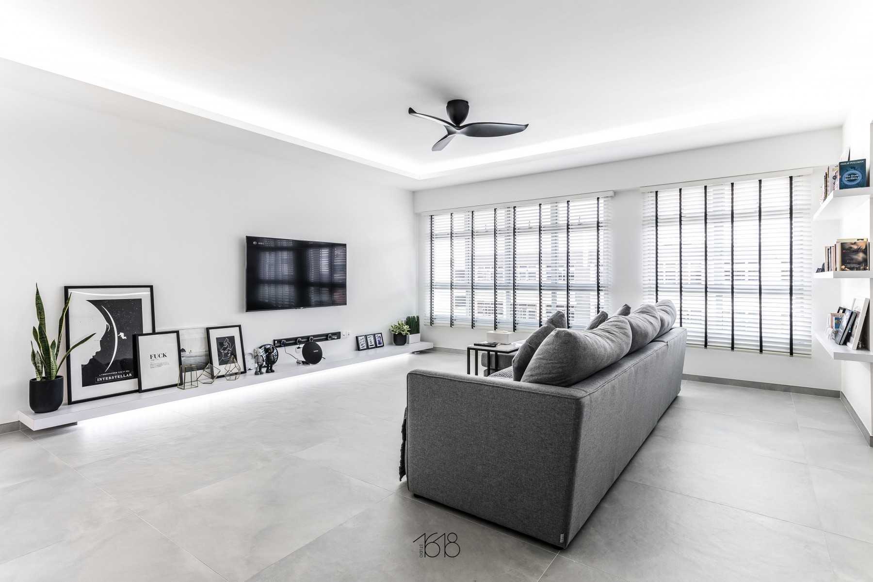 Minimalist Living Room with Homogeneous Tiles and TV Console