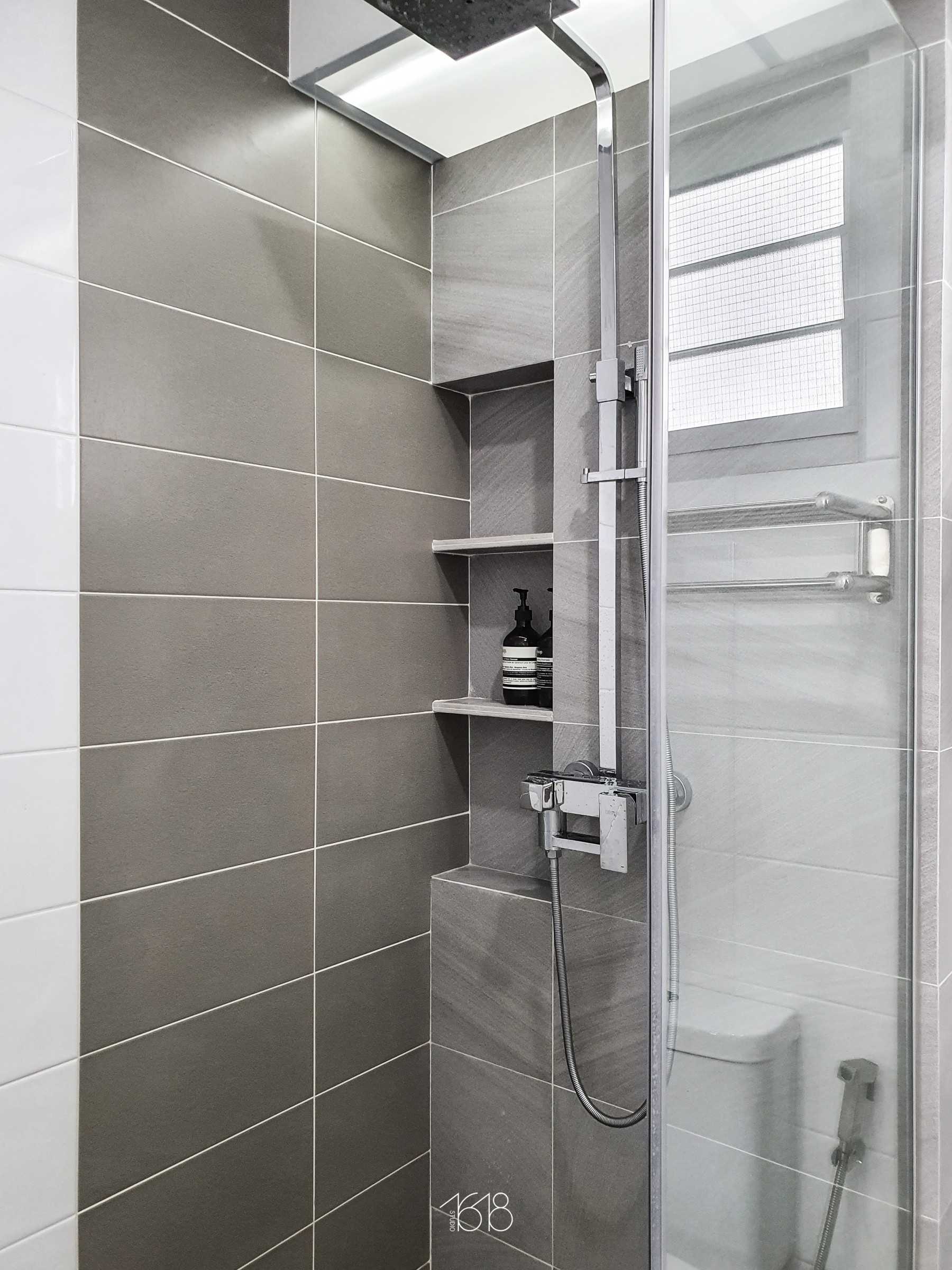 Minimalist Bathroom with Homogeneous Tiles and Shower Screen