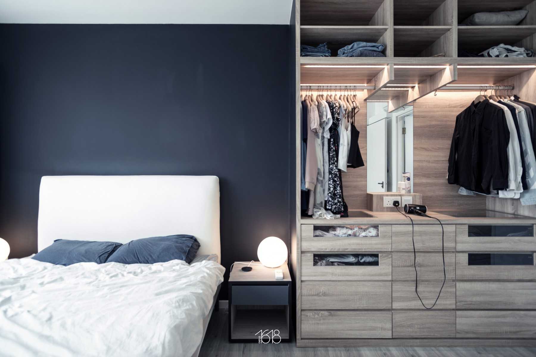 Minimalist Bedroom with Vinyl Flooring and Mirror