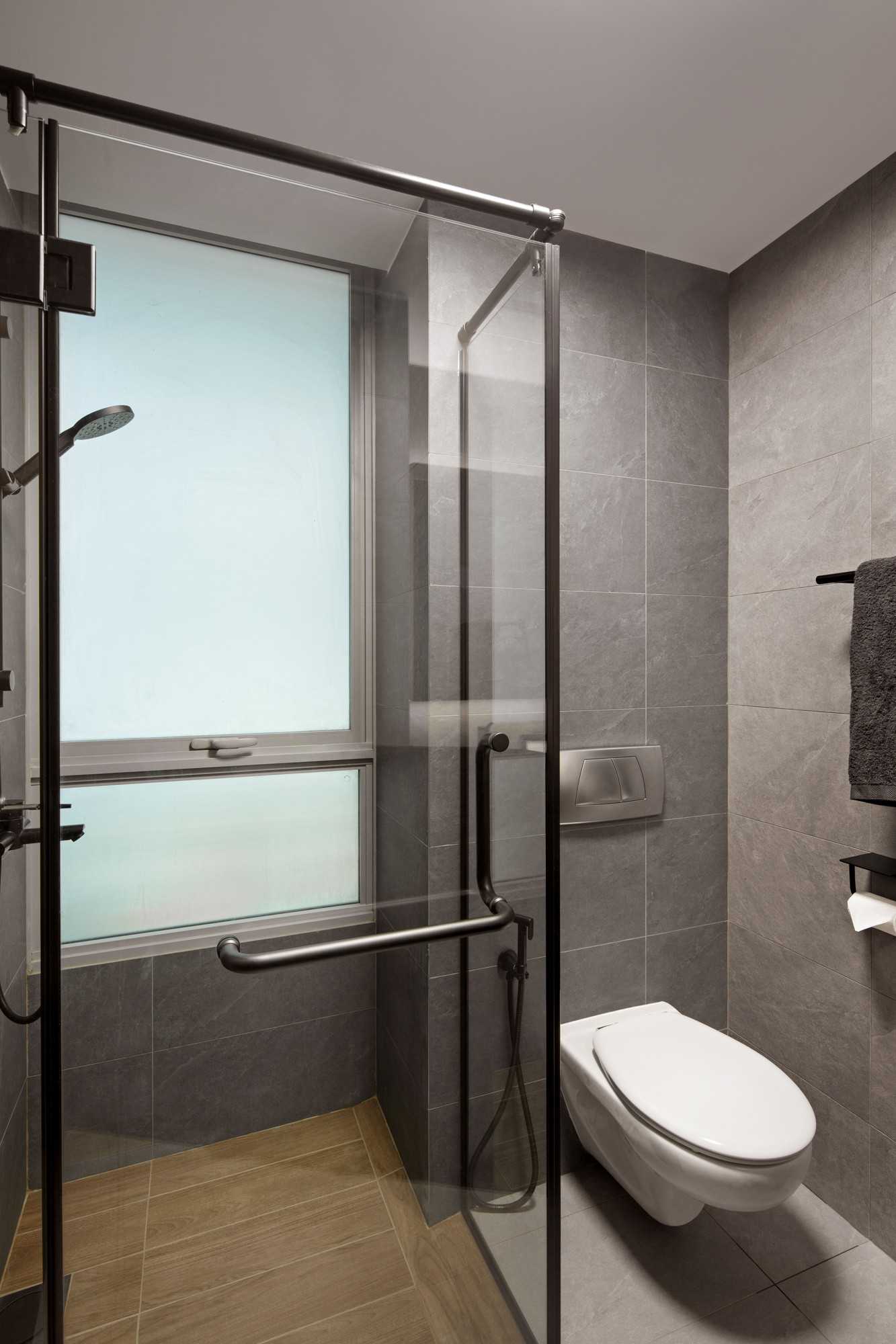 Contemporary Bathroom with Wood Flooring and Shower Screen