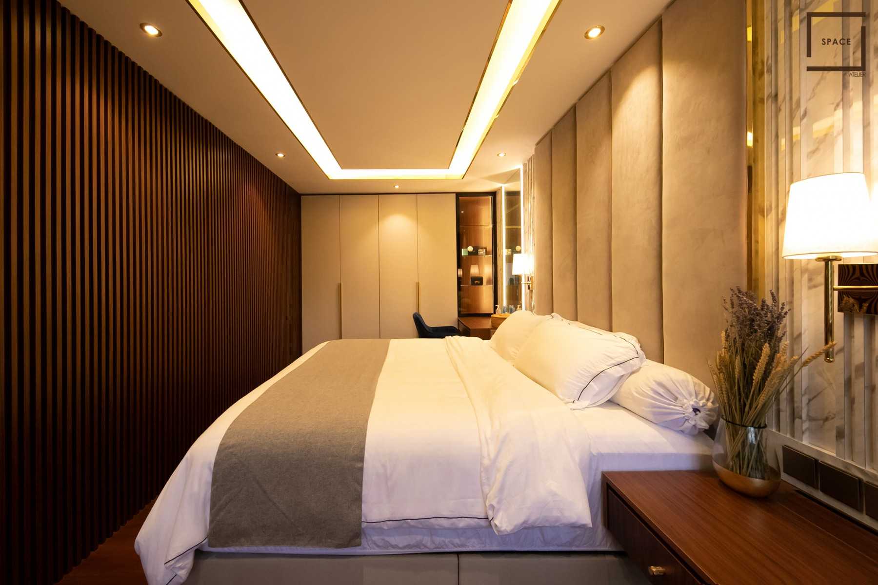 Modern Bedroom with Cove Lighting and Ceiling Light