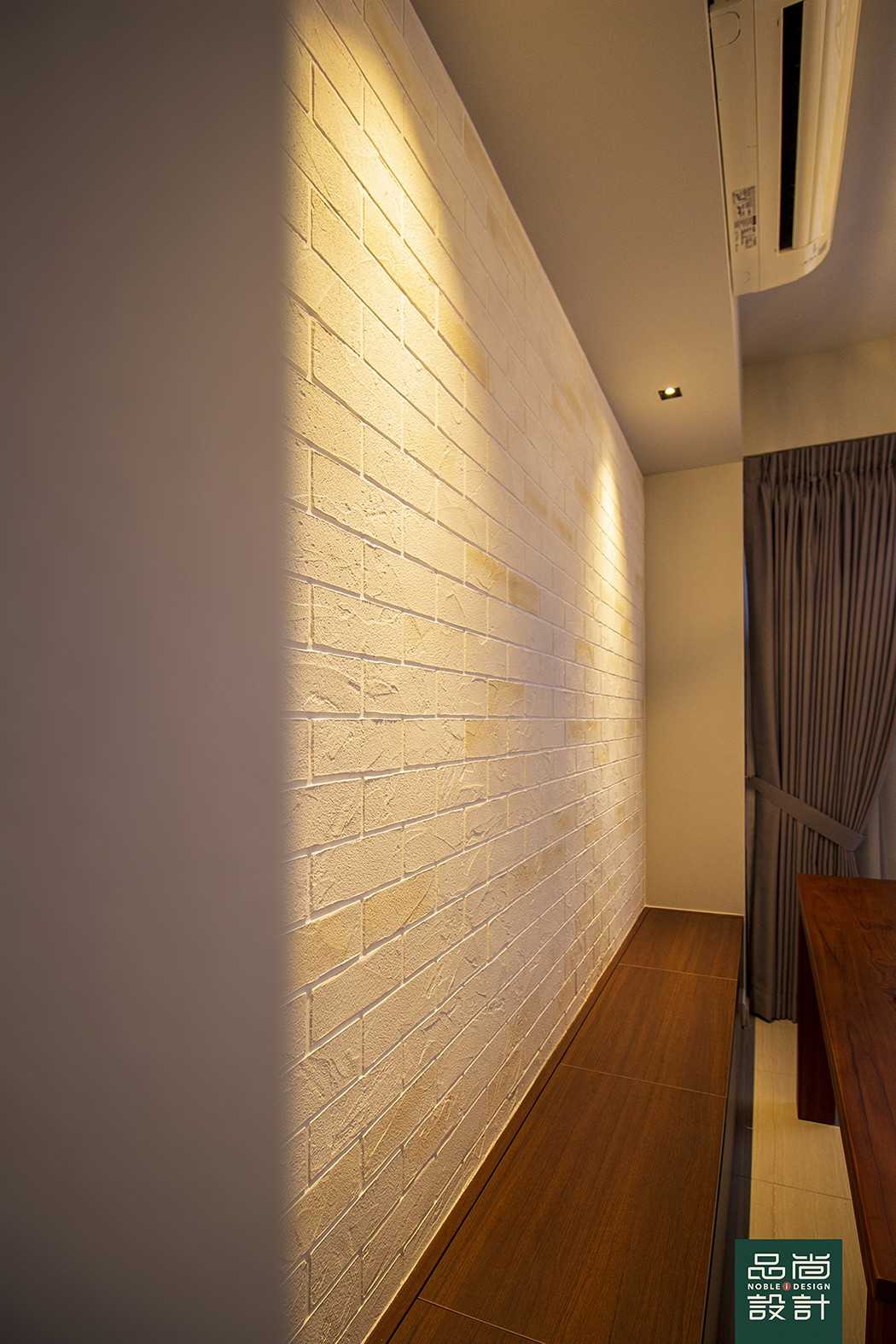 Asian Dining Room with Feature Wall and Seating Bench