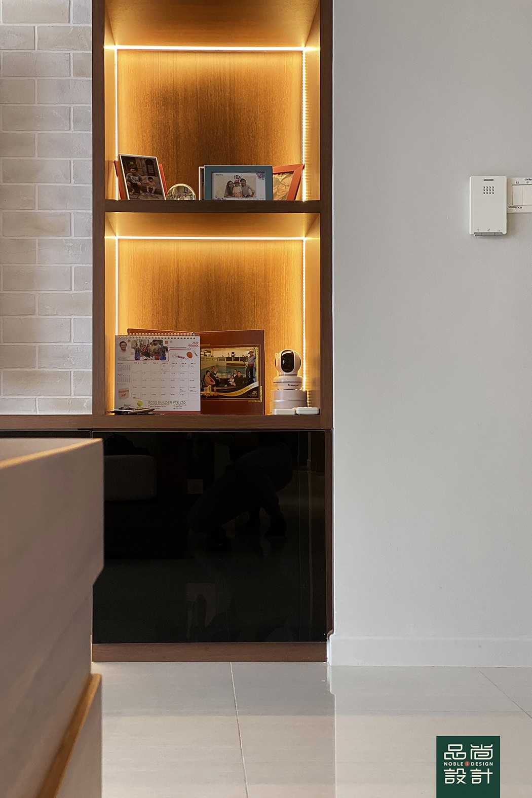 Asian Living Room with Bookshelf and Homogeneous Tiles