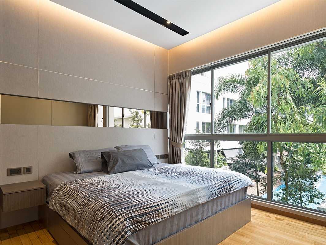Modern Bedroom with Cove Lighting and Bedside Table