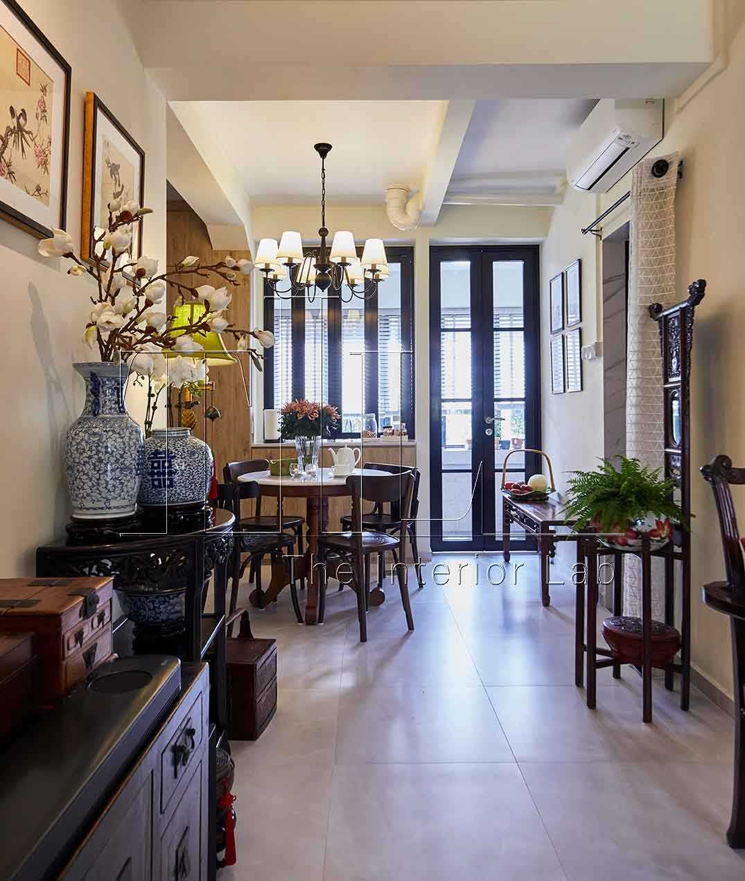 Asian Dining Room with Glass Door and Ceiling Light