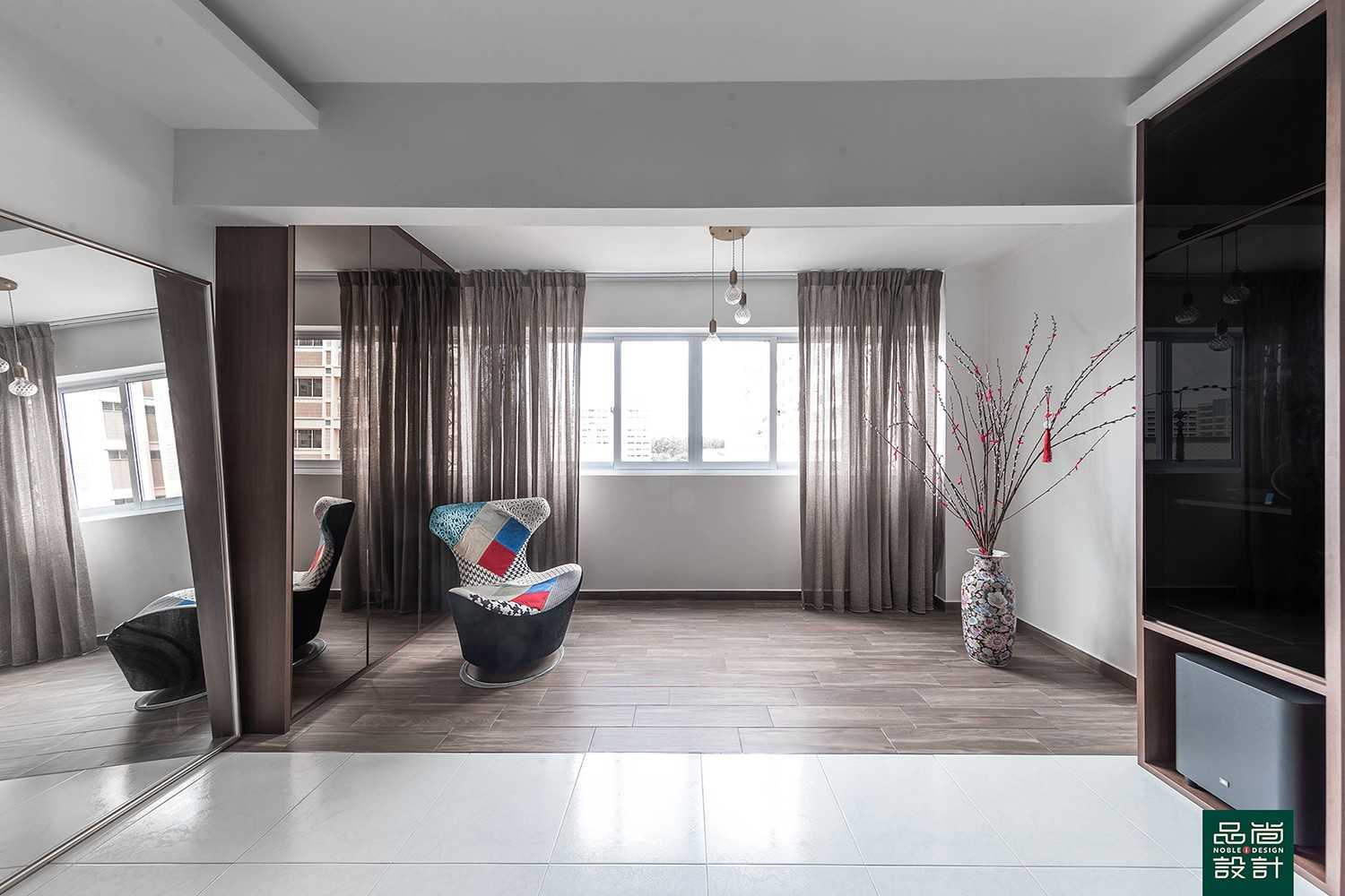 Modern Foyer with Homogeneous Tiles and Mirror