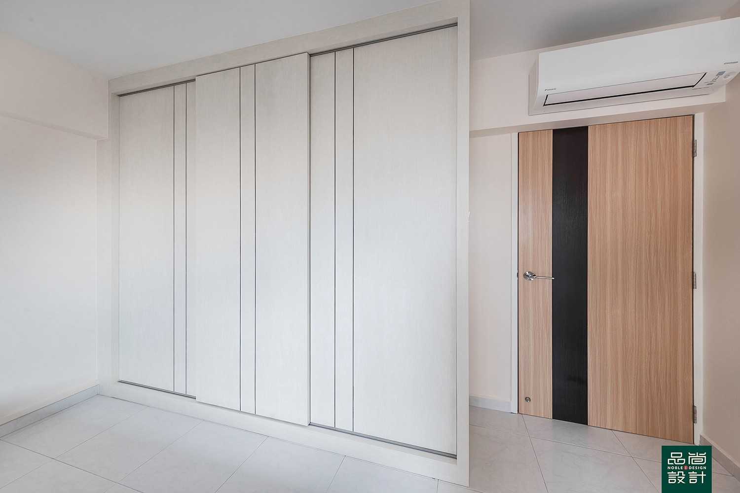 Modern Bedroom with Homogeneous Tiles and Wardrobe