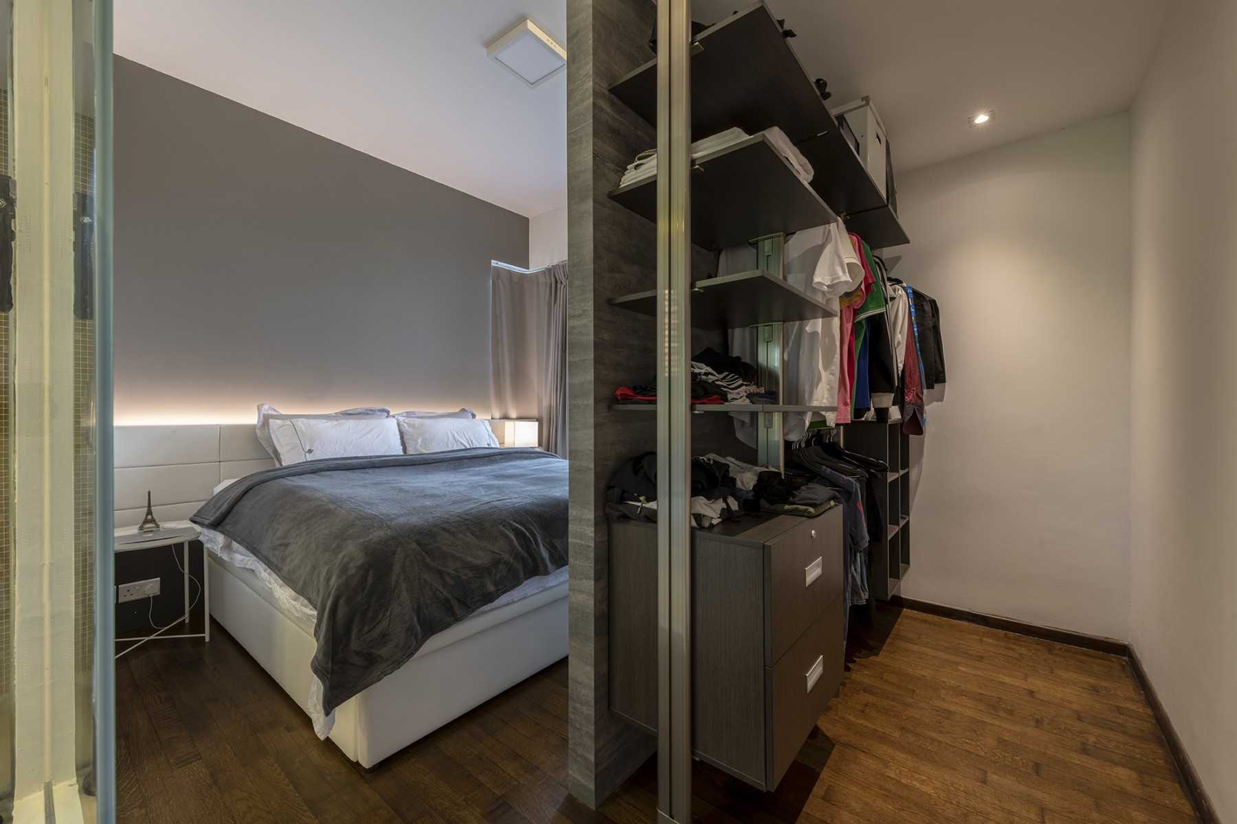 Modern Bedroom with Wood Flooring and Wardrobe