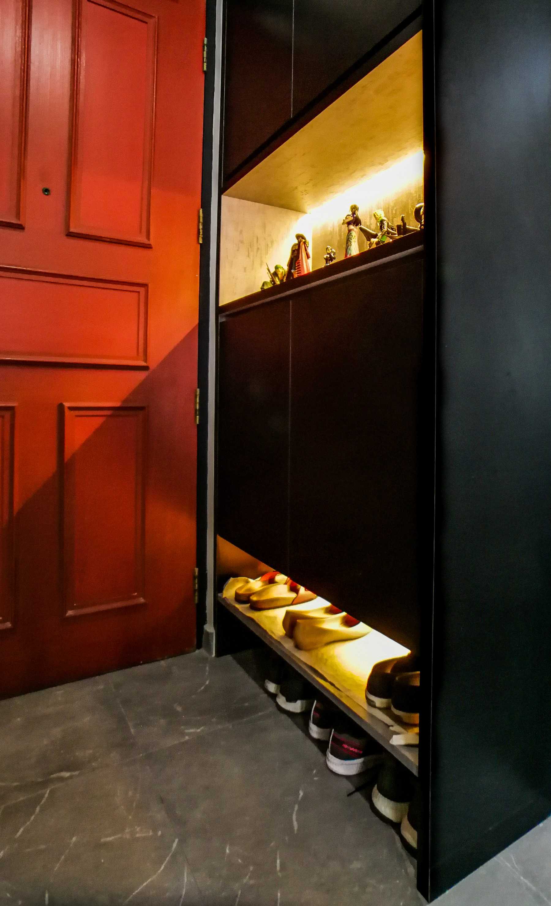 Scandinavian Entryway with Shoe Cabinets and Lighting