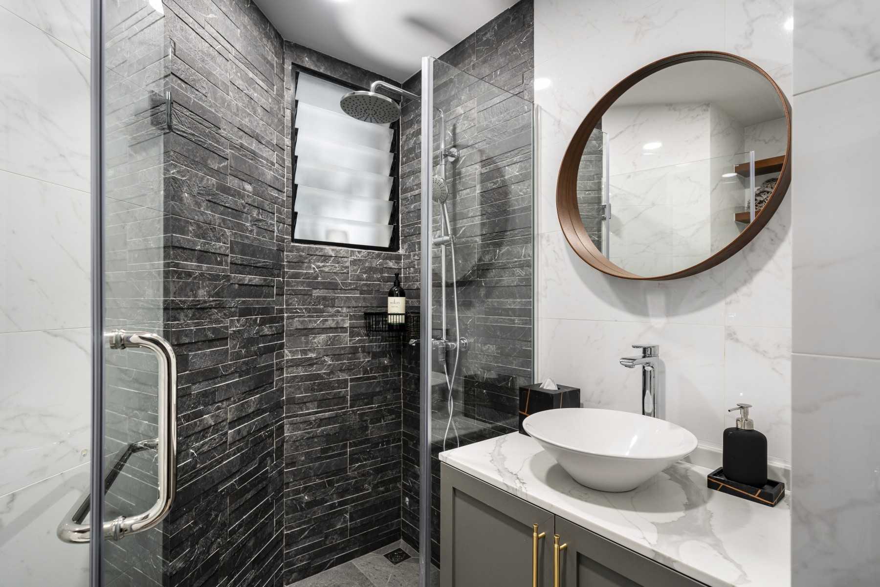 Scandinavian Bathroom with Homogeneous Tiles and Feature Wall
