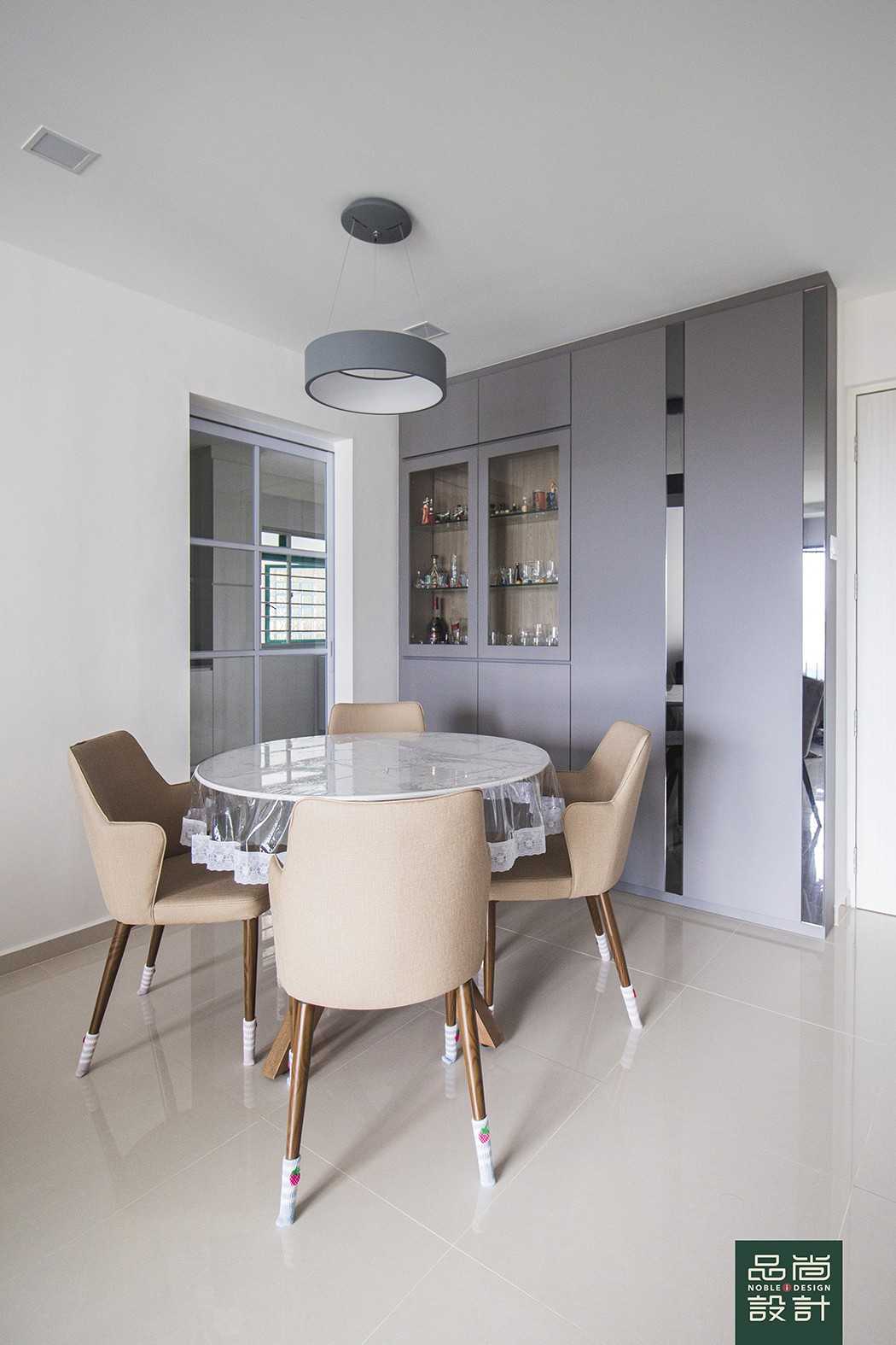 Modern Dining Room with Homogeneous Tiles and Storage Cabinets