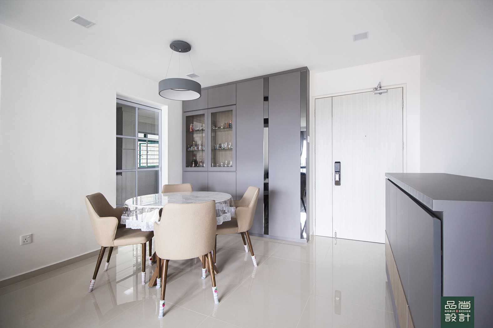Modern Dining Room with Homogeneous Tiles and Storage Cabinets