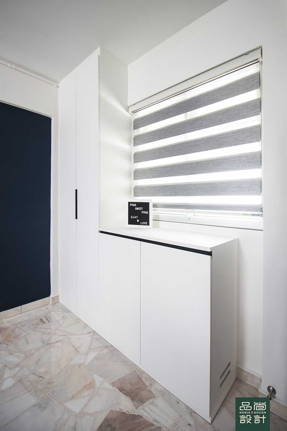 Modern Foyer with Paintings and Shoe Cabinets