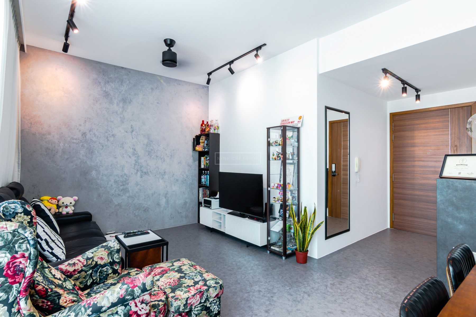 Industrial Living Room with Bookshelf and Mirror
