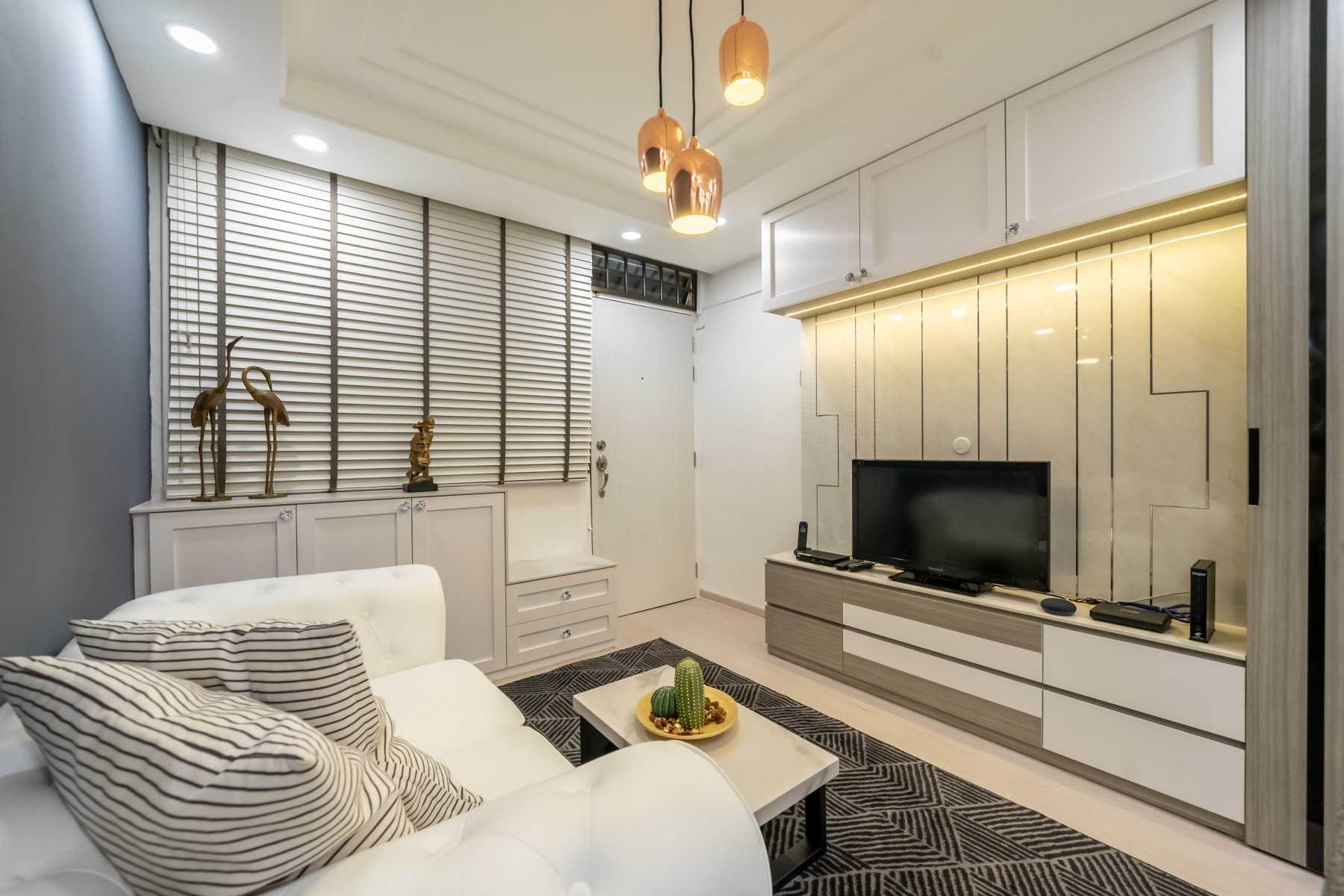Modern Living Room with Homogeneous Tiles and Sofa