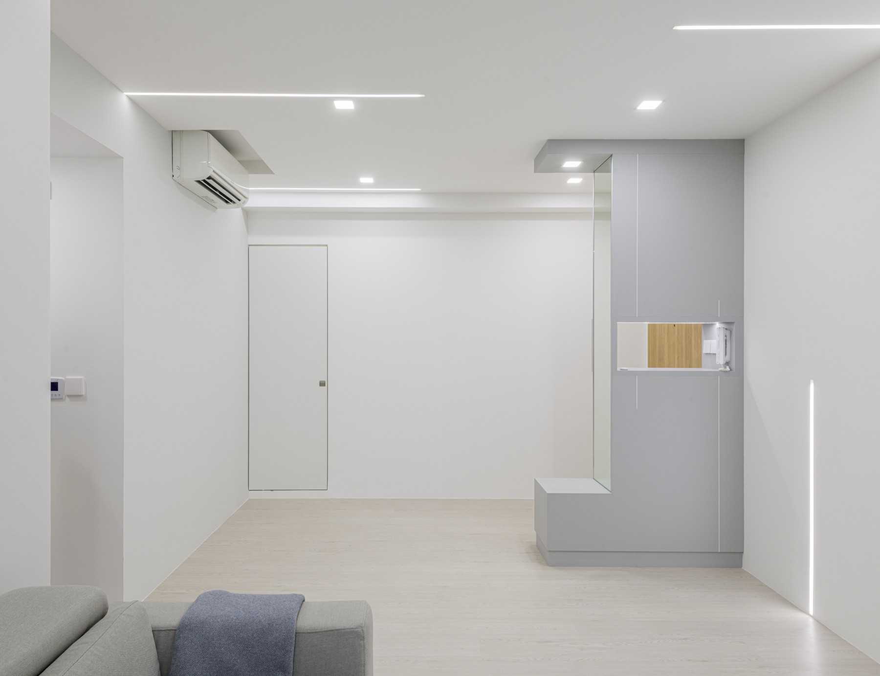 Modern Entryway with Mirror and Seating Bench