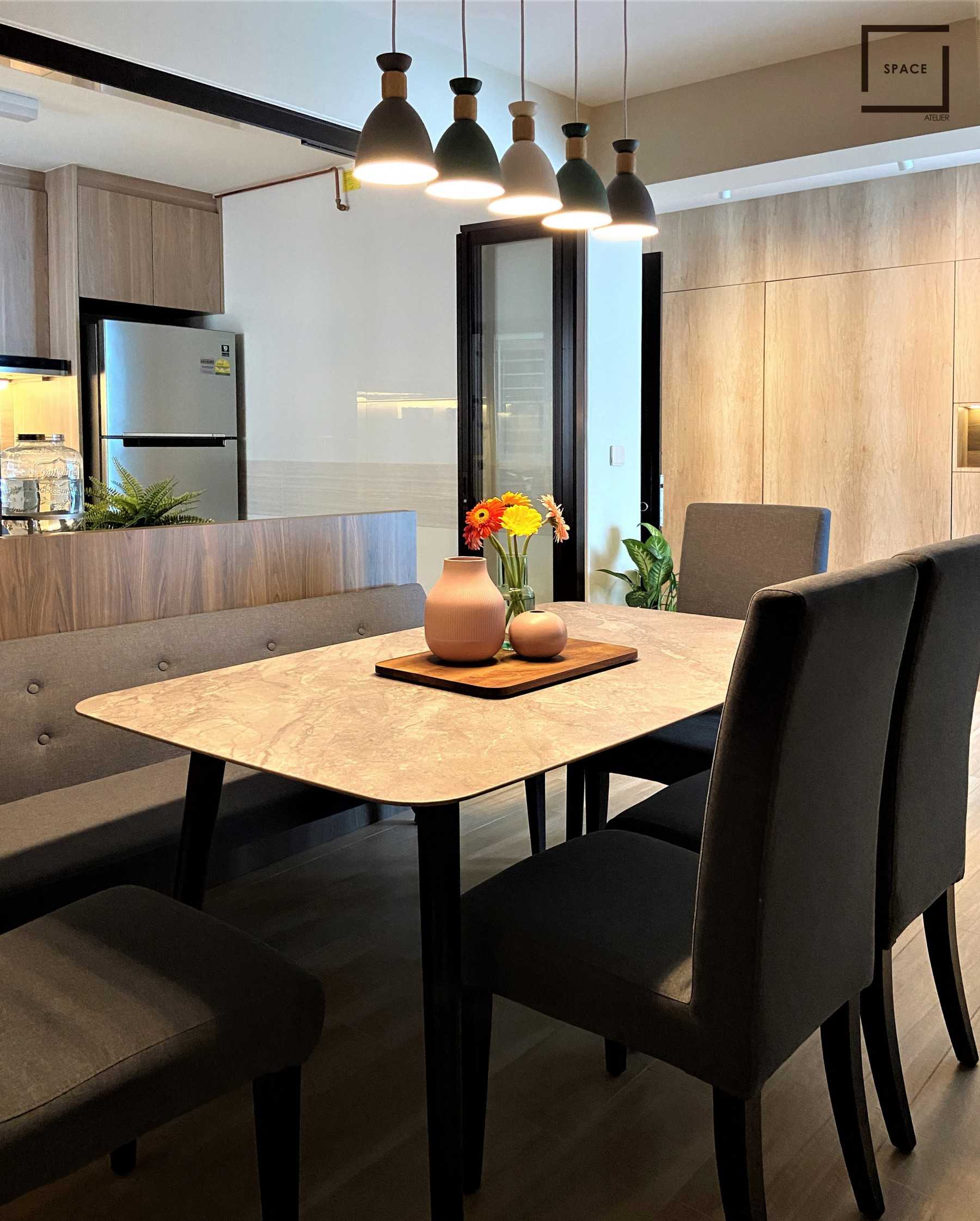 Contemporary Dining Room with Drop Light and Dining Table