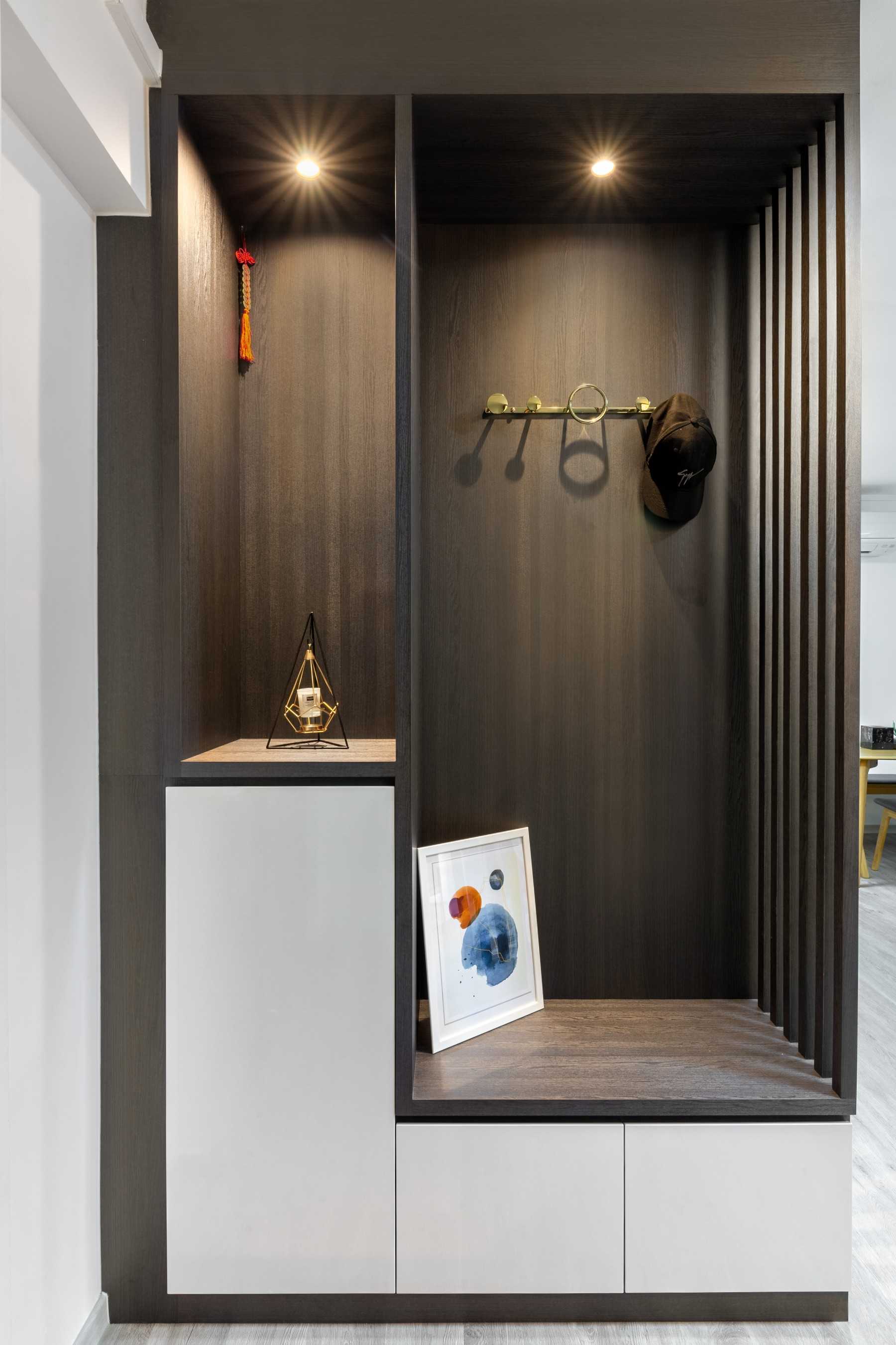 Minimalist Foyer with Shoe Rack and Display Cabinets