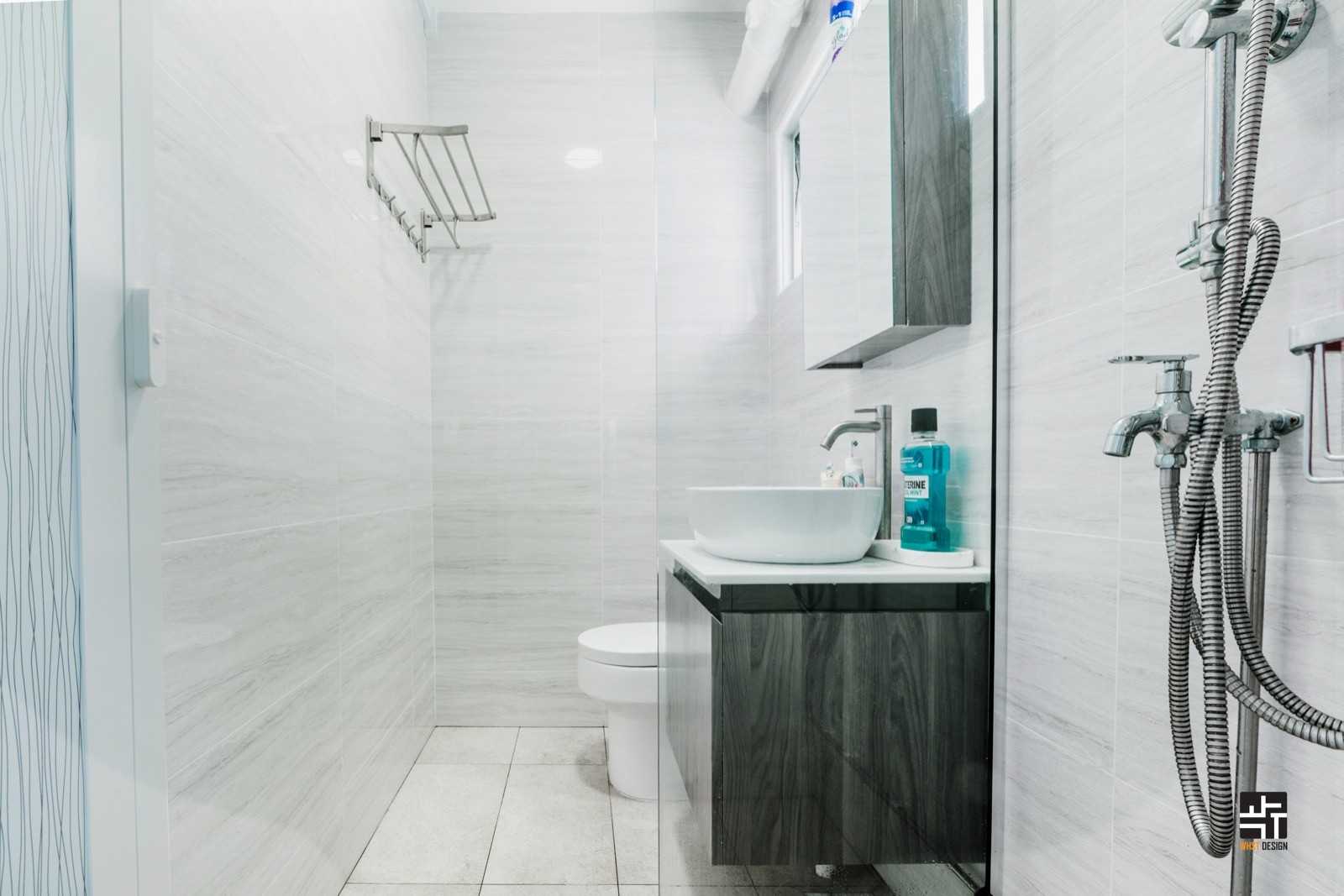 Modern Bathroom with Countertop and Herringbone Tiling