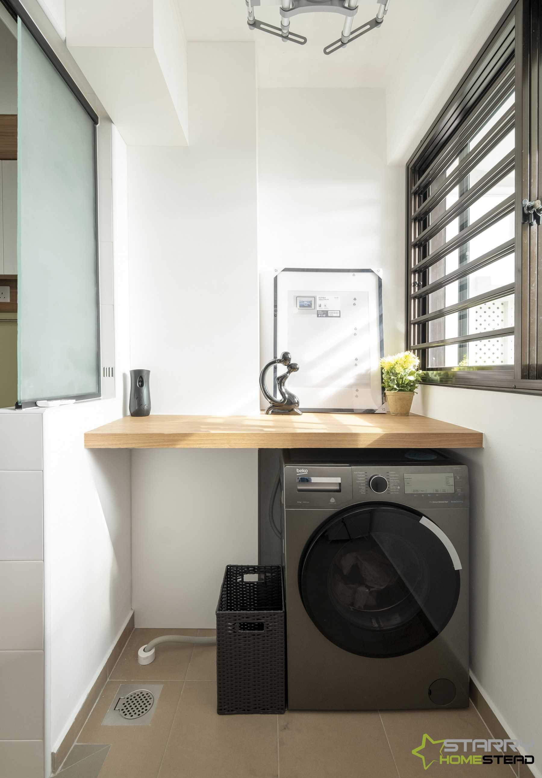 Scandinavian Service Yard with Washing Machine and Laundry Baskets