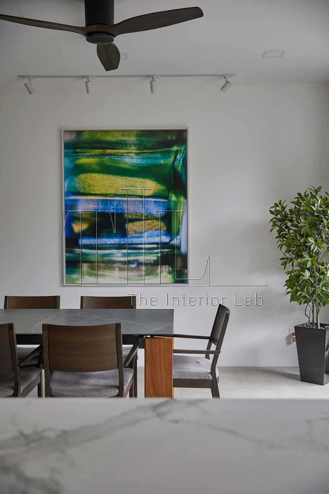 Contemporary Dining Room with Countertop and Artwork