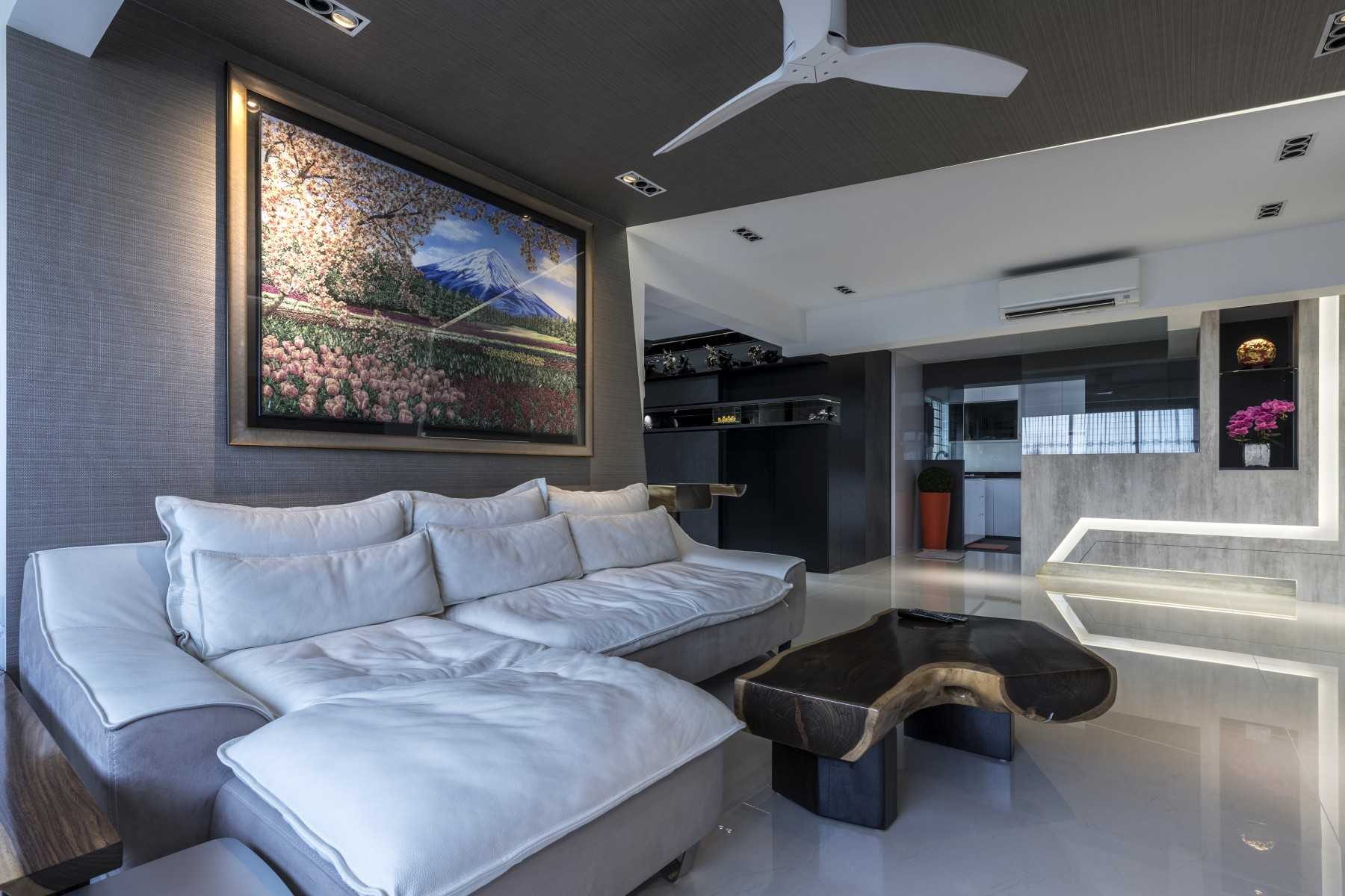 Modern Living Room with Bookshelf and Homogeneous Tiles