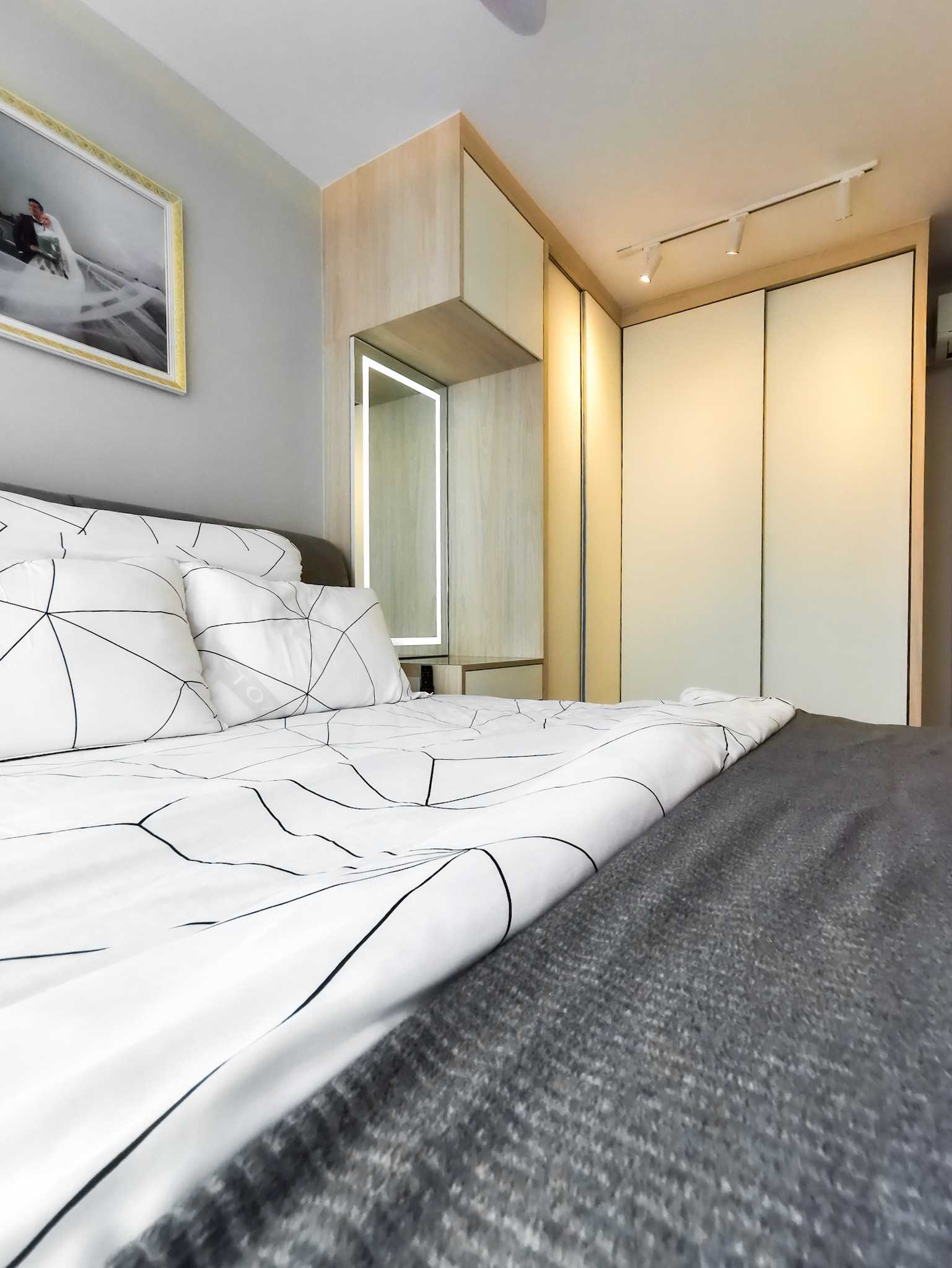 Contemporary Bedroom with Mirror and Wardrobe