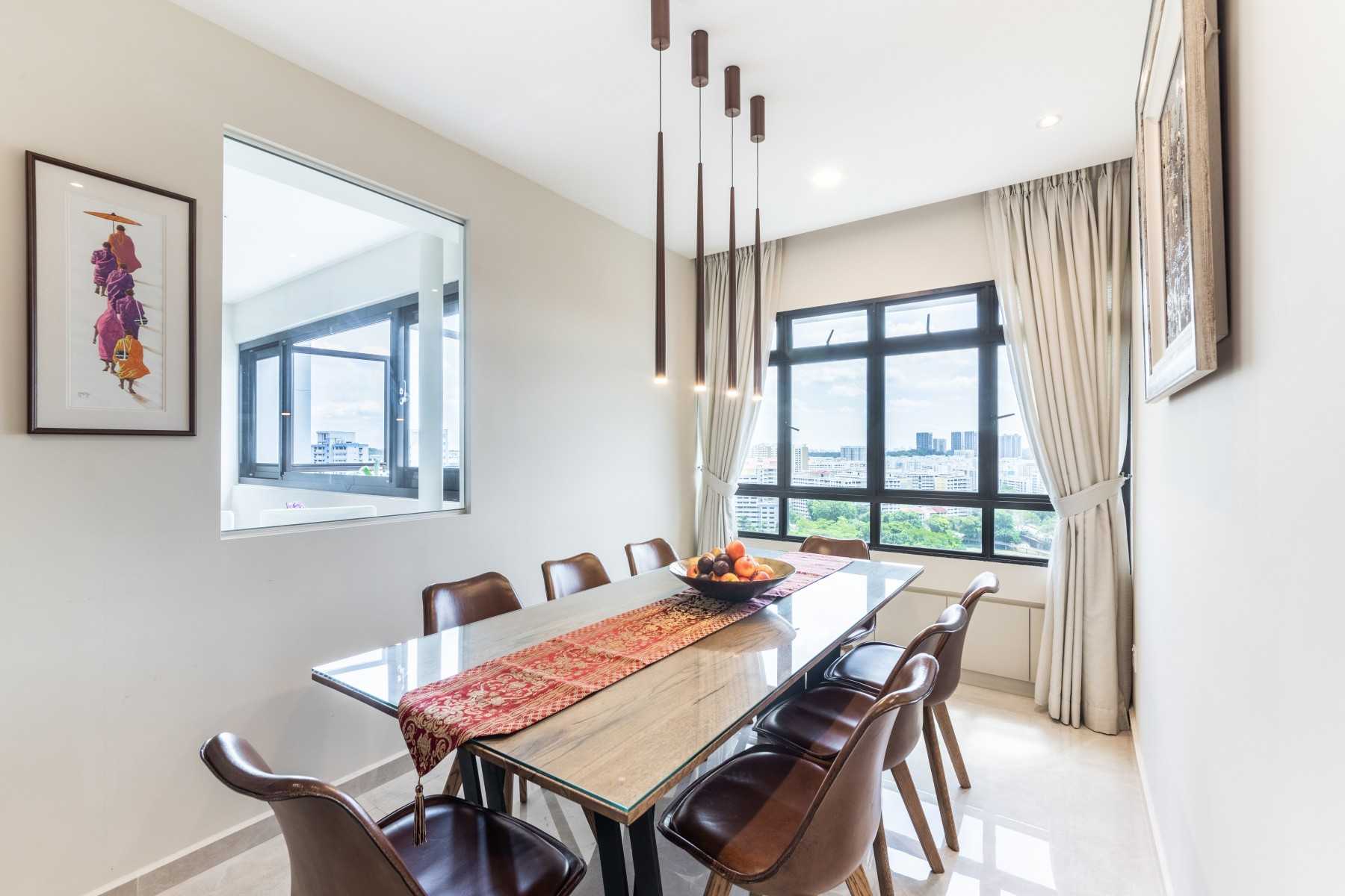 Contemporary Dining Room with Chandelier and Dining Table