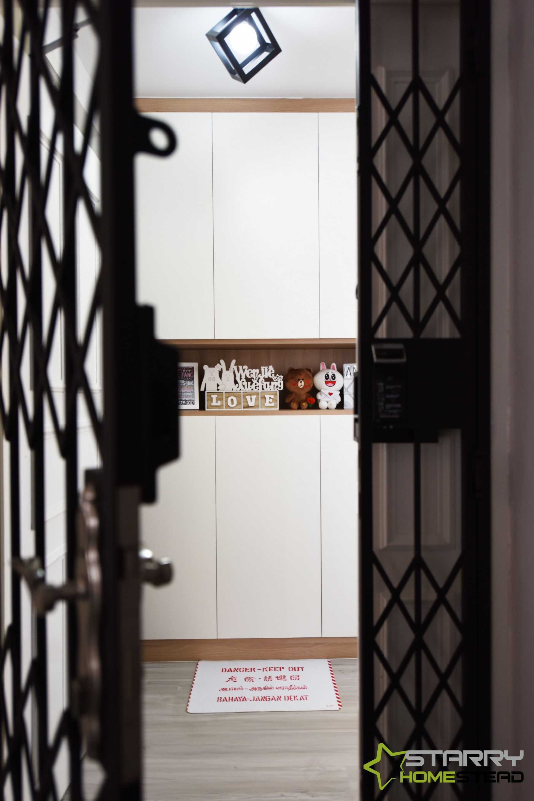 Scandinavian Entryway with Shoe Cabinets and Doors