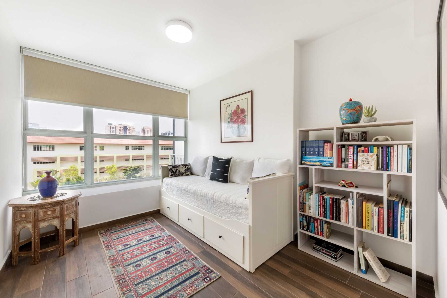 Scandinavian Study with Bookshelf and Ceiling Light