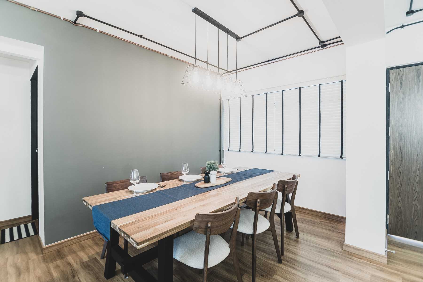 Industrial Dining Room with Lighting and Decorative Lighting